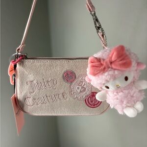 Juicy Couture Pale Pink Suede-Look Logo Wristlet with Plush Bow Charm